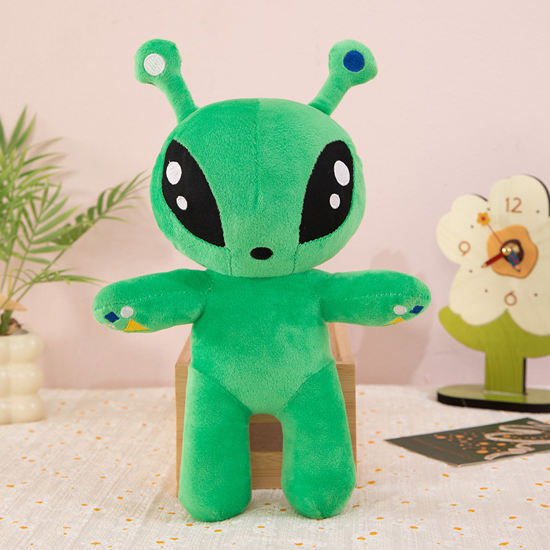 Green big eyed alien plush toy - Image 2